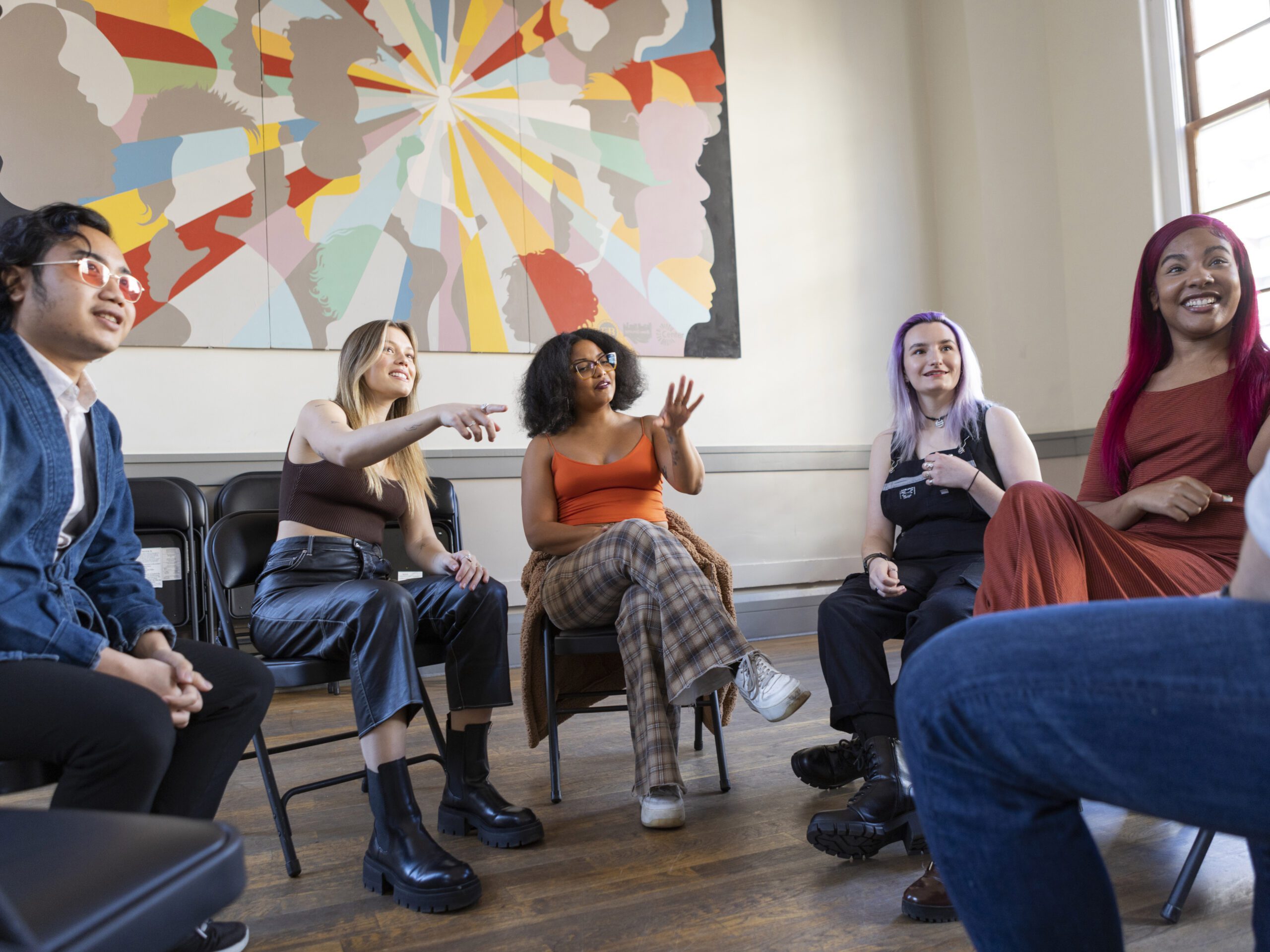 Queer people at a social group at The Center