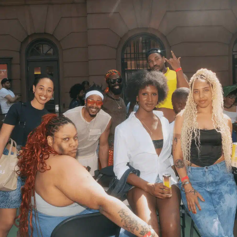 Attendees posing at Juneteenth Block Party outside