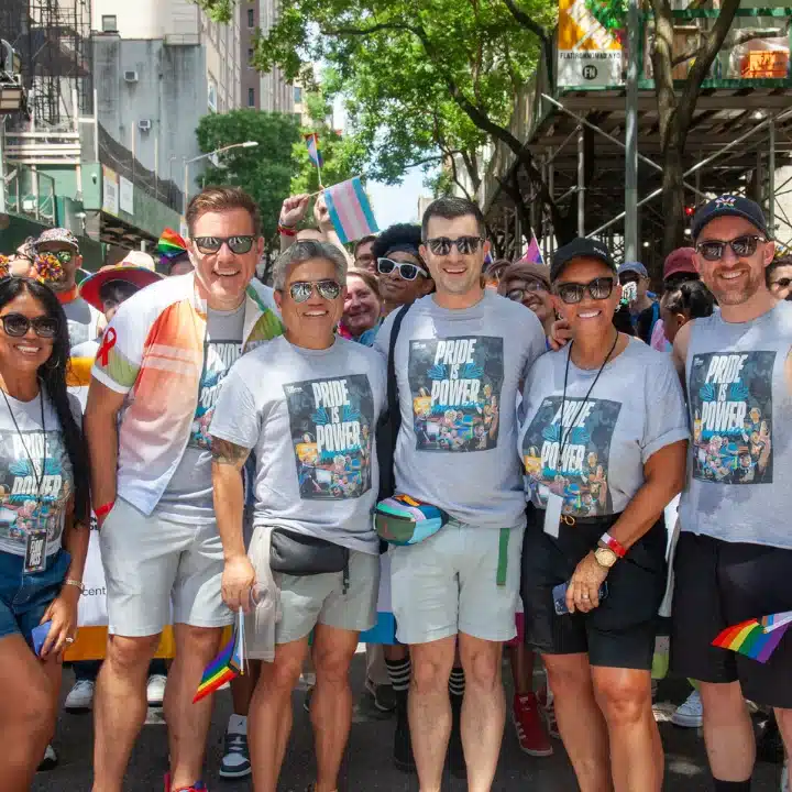 Jeffrey Klein, Dr. Carla Smith, Erwin de Leon, and others smiling before march