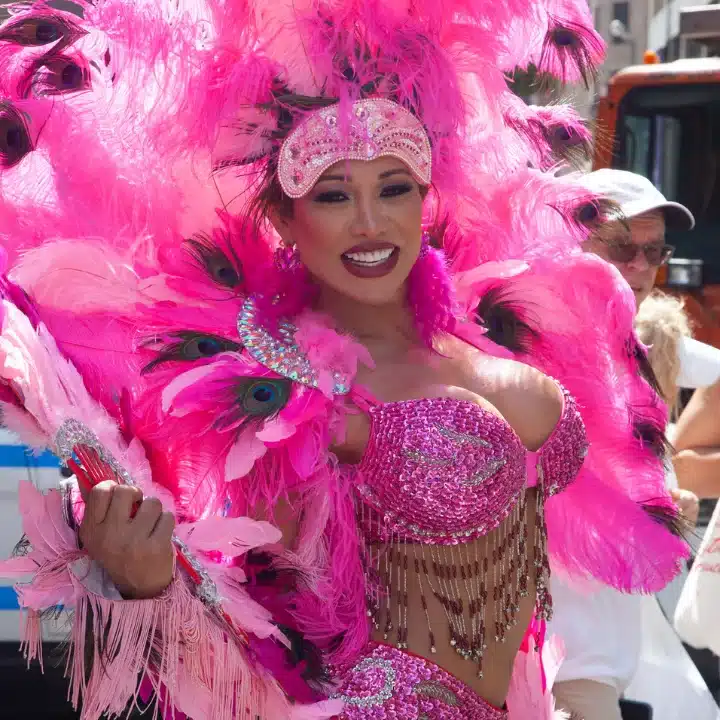 Trans woman in pink Pride outfit