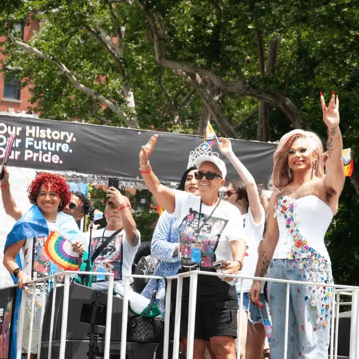Dr Carla Smith and community members on The Center's float