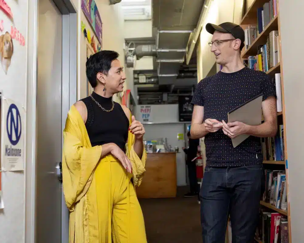 A gay man and nonbinary person discuss signs of an abusive relationship
