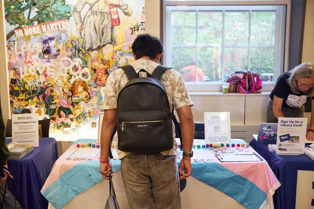 LGBT child with backpack discovering trans resources