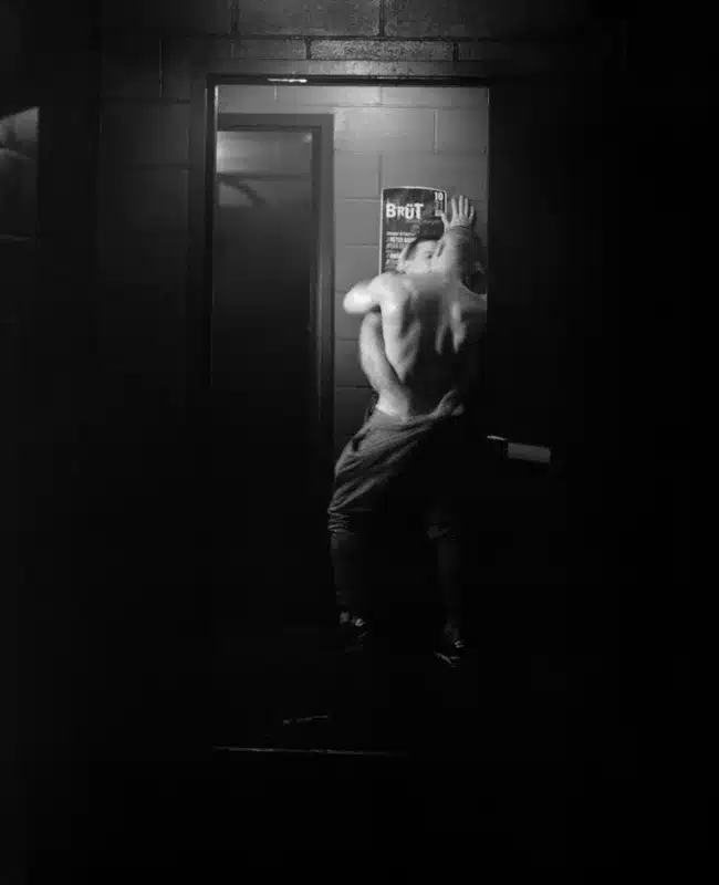 Two gay men kissing